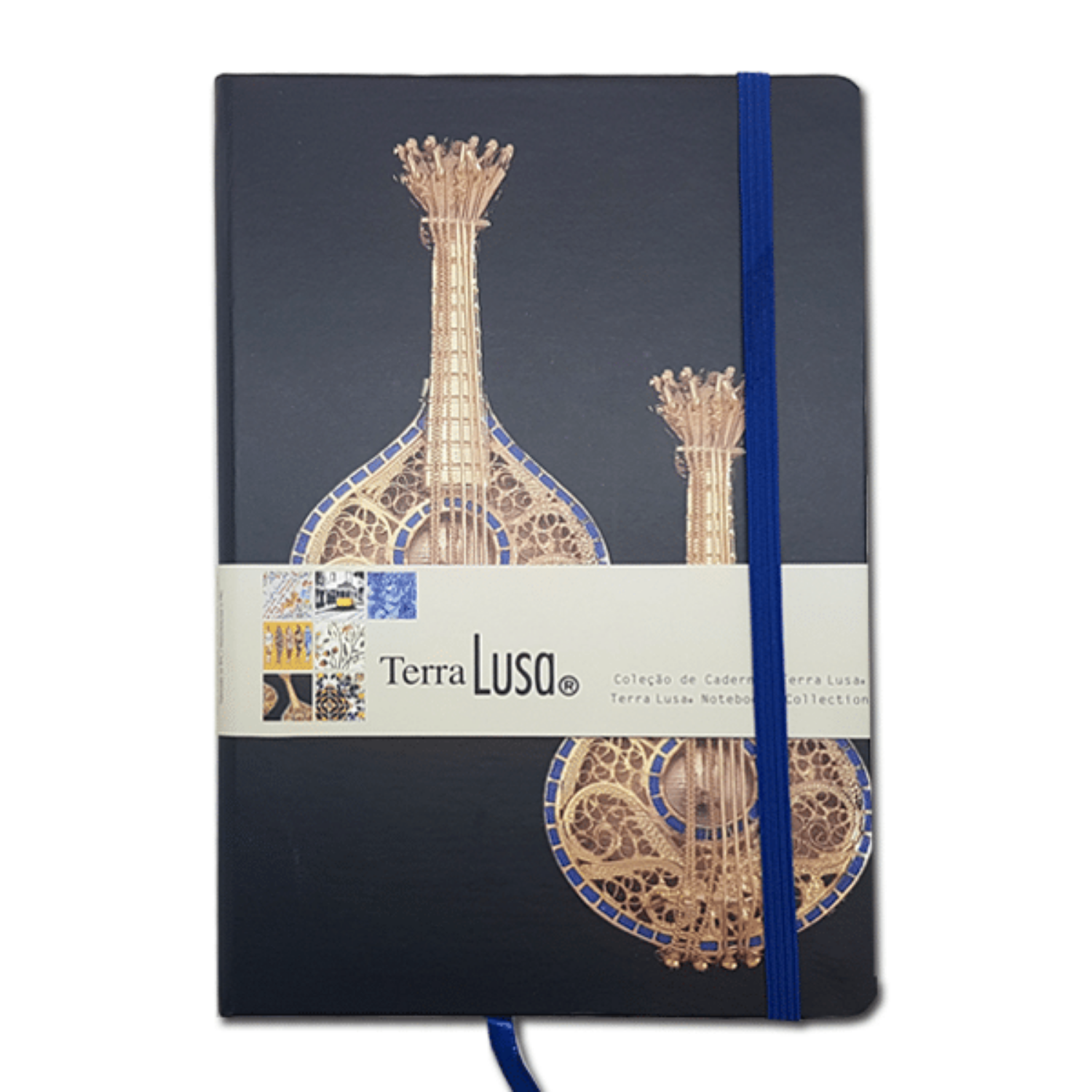 A hardcover notebook with a dark navy cover featuring an ornate gold and blue guitar illustration, wrapped with a white paper band labeled 'Terra Lusa'.