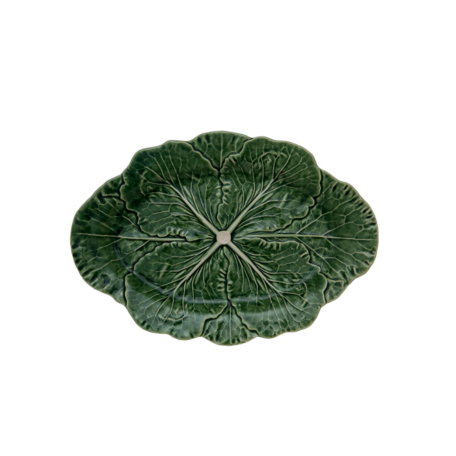 Green ceramic plate with leaf design on a white background