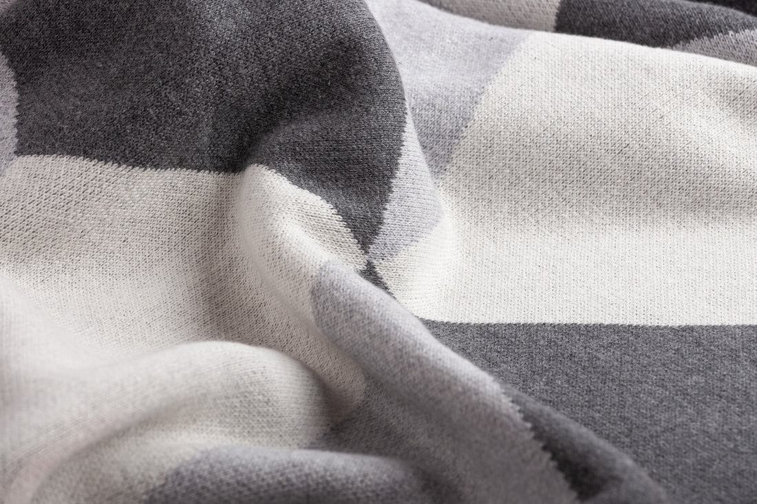 Close-up of a gray and black checkered fabric texture