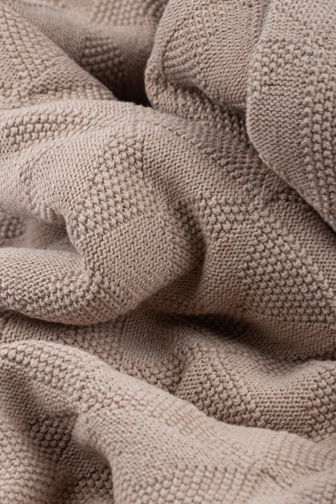 Close-up of a textured beige fabric
